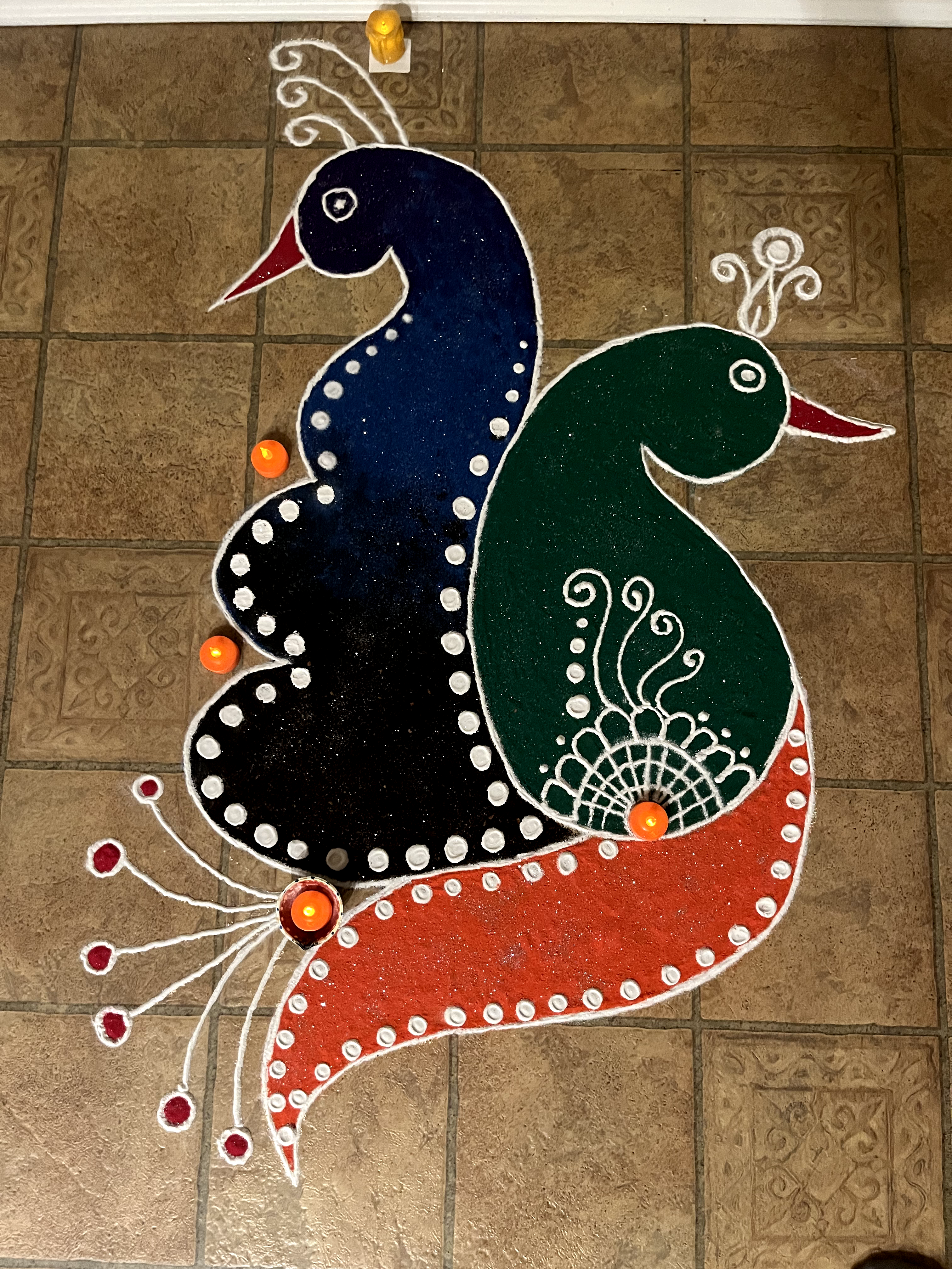 Peacock Rangoli which is also known as sand art